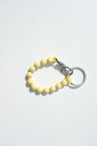 Short Perlen Keychain in Pastel Yellow